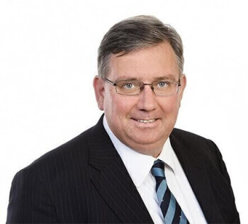 Dr. Simon J. Evenett